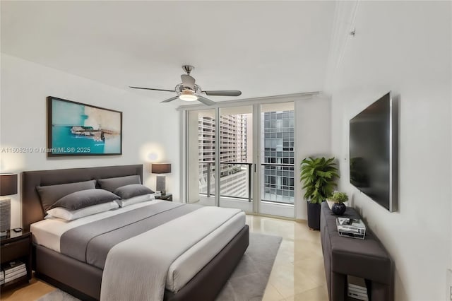 tiled bedroom with ceiling fan, expansive windows, and access to outside