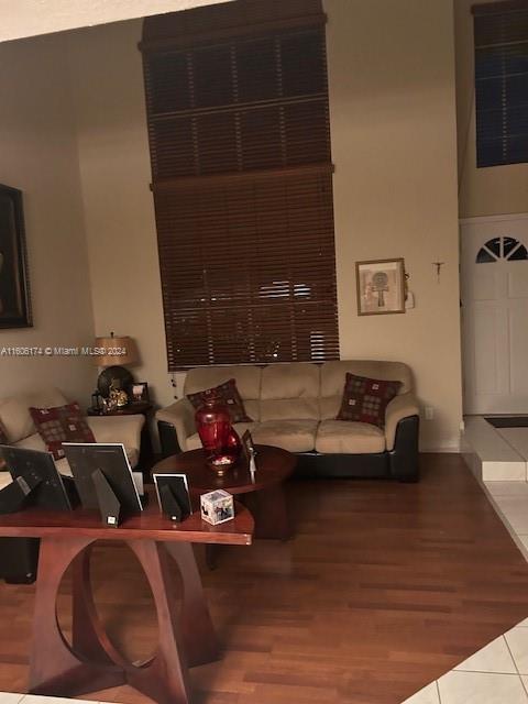 living room featuring tile patterned floors