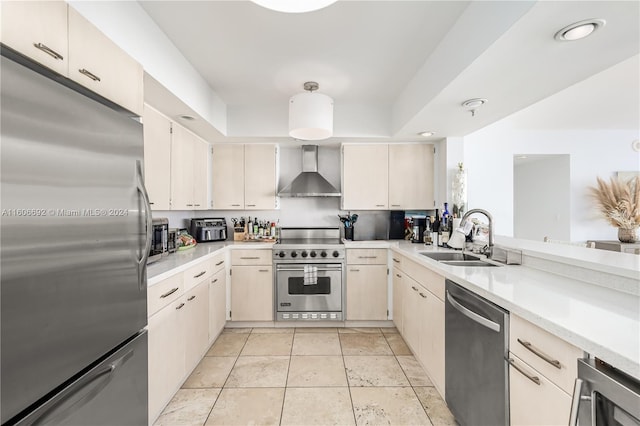 kitchen featuring wall chimney range hood, sink, wine cooler, light tile patterned flooring, and stainless steel appliances