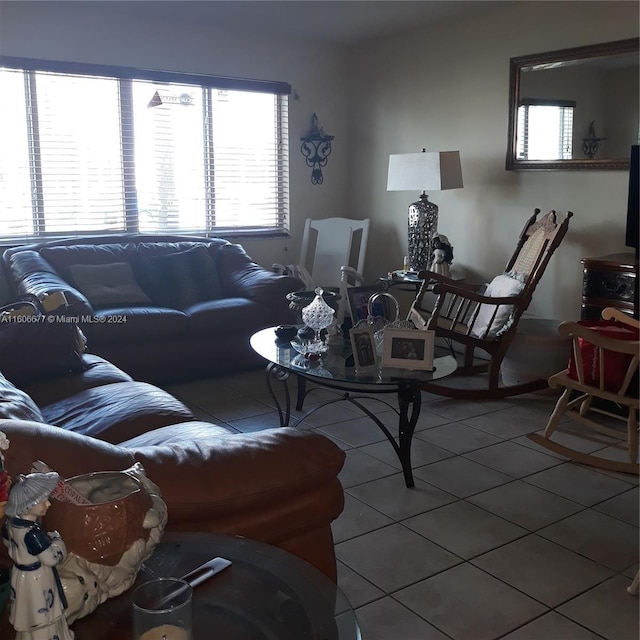 living room with tile patterned flooring