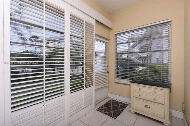 interior space with tile patterned floors