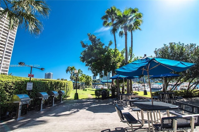 view of property's community with a patio