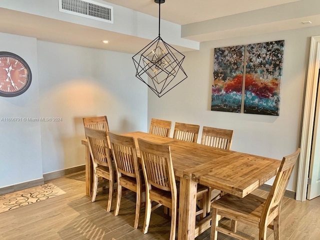 dining room with light hardwood / wood-style flooring