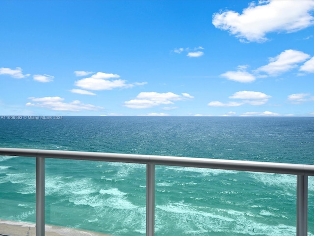 view of water feature with a beach view