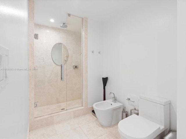 bathroom with tile patterned floors, an enclosed shower, toilet, and a bidet