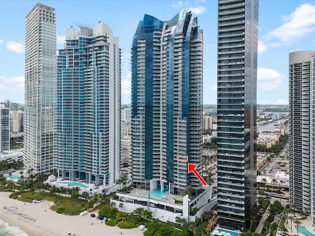 view of property with a view of the beach