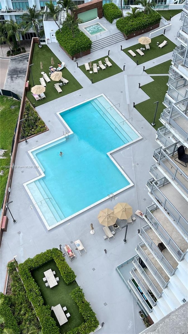 view of swimming pool featuring a patio