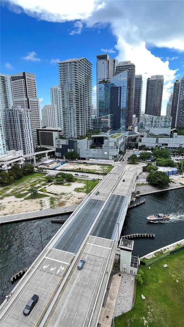property's view of city featuring a water view
