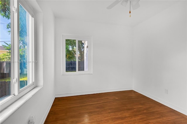 empty room with wood-type flooring and ceiling fan