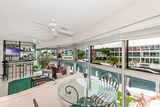 interior space featuring ceiling fan