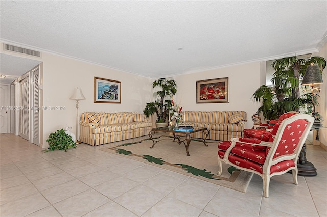 tiled living room featuring a textured ceiling and crown molding