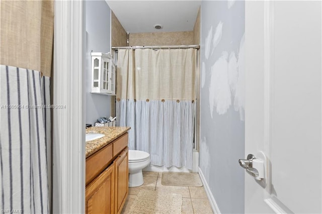 bathroom featuring shower / bathtub combination with curtain, vanity, toilet, and tile patterned floors