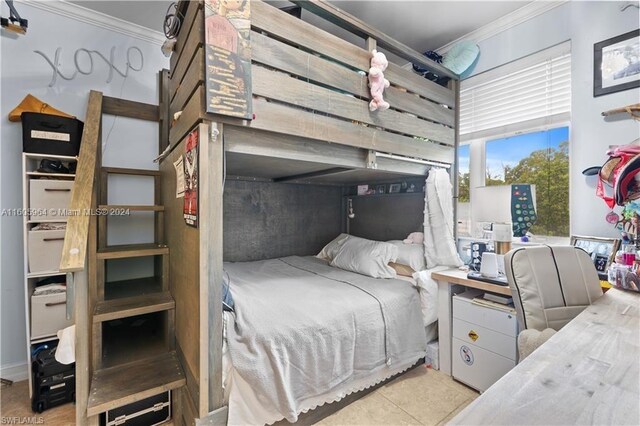 bedroom with ornamental molding