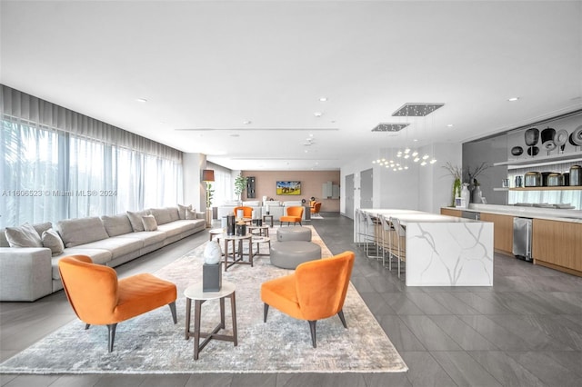 living room featuring dark tile patterned flooring