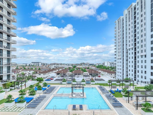 view of pool featuring a pergola and a patio