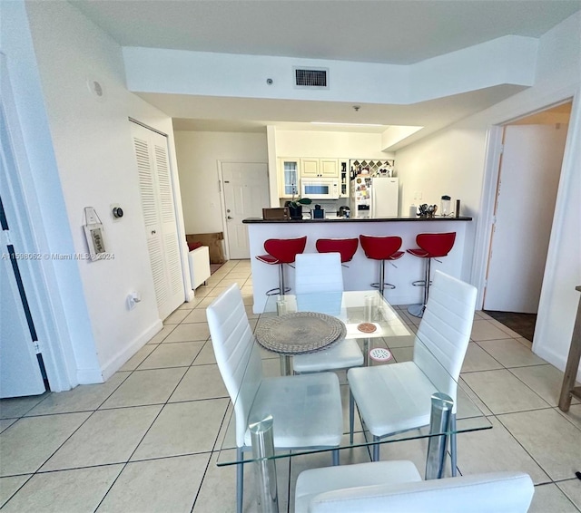 view of tiled dining room