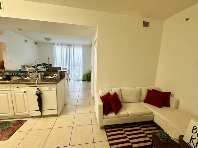 living room featuring light tile patterned floors