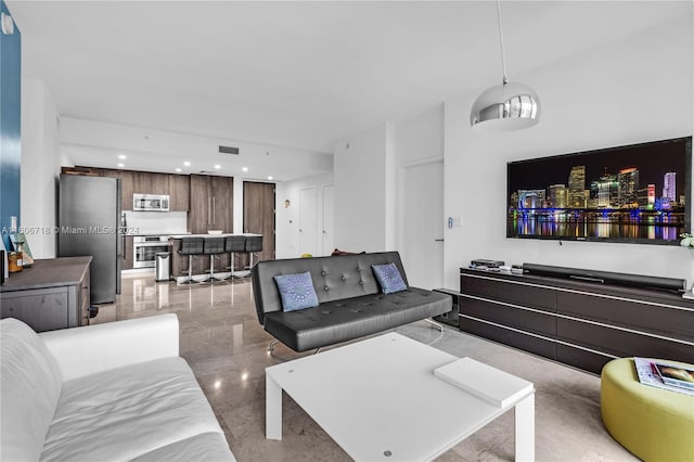 living room with light tile flooring