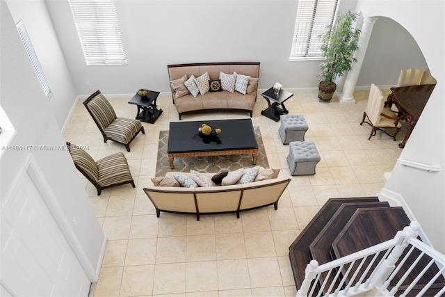 tiled living room with ornate columns