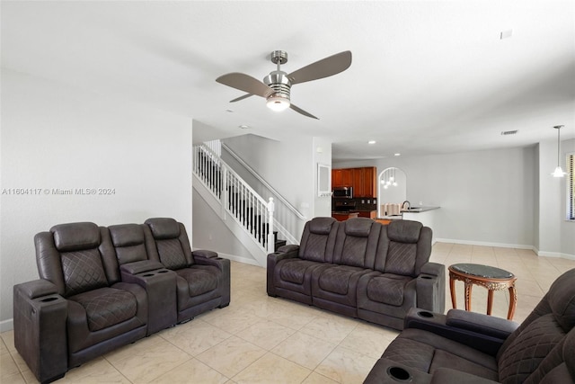 living room with ceiling fan