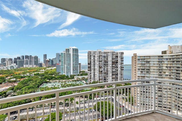 balcony featuring a water view