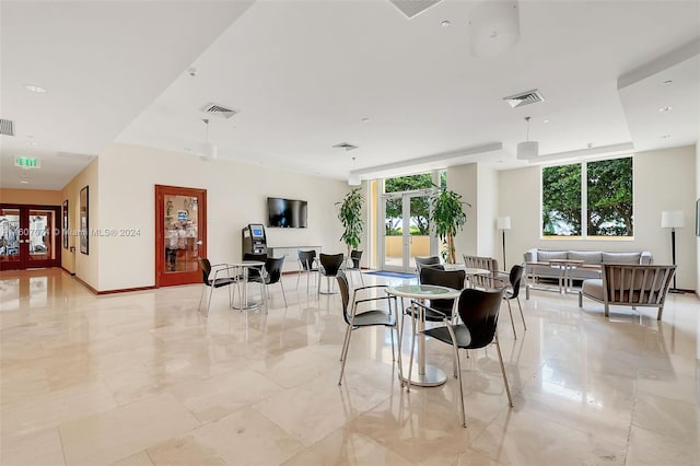 dining space featuring french doors