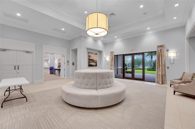 bedroom featuring french doors, access to outside, light tile patterned floors, a tray ceiling, and a towering ceiling