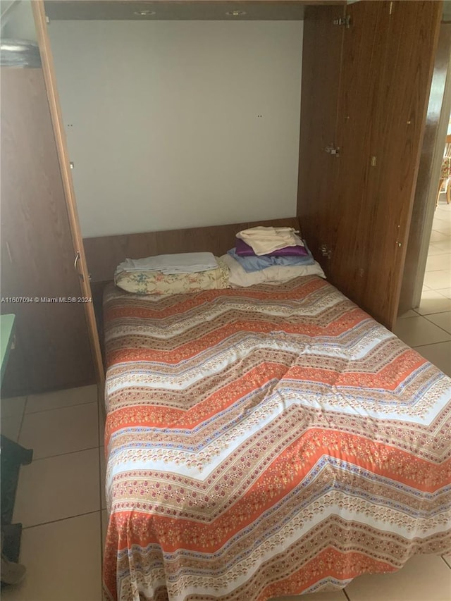 bedroom with tile patterned flooring