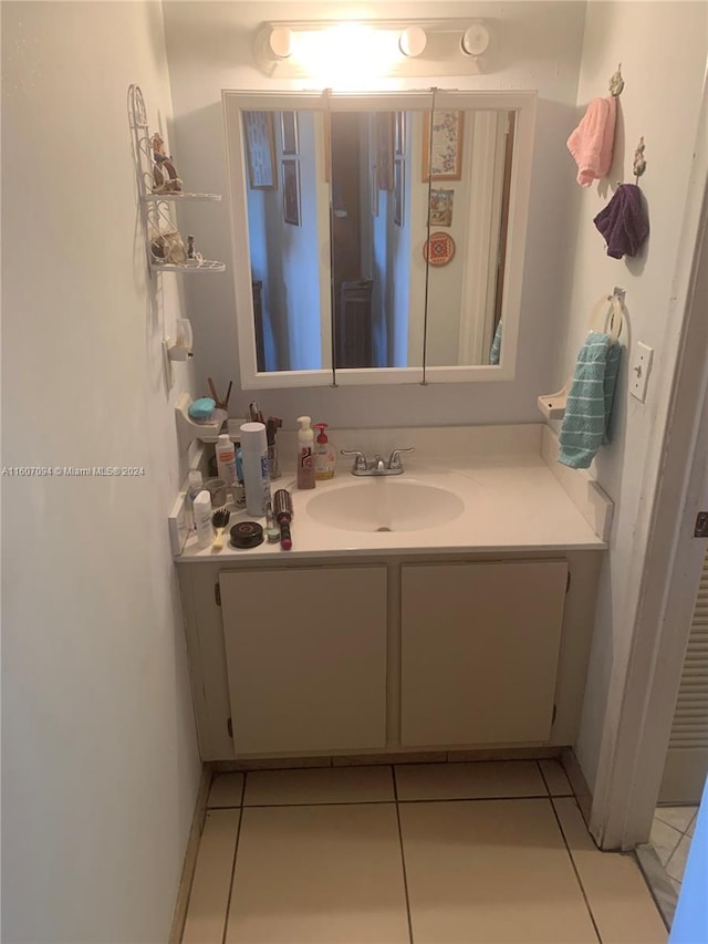 bathroom featuring vanity and tile patterned floors