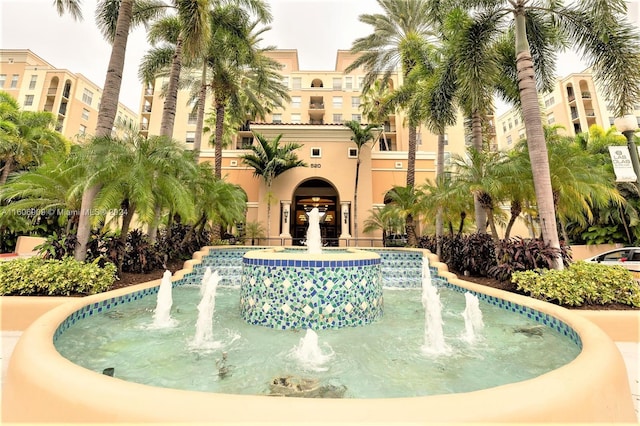 view of swimming pool featuring pool water feature