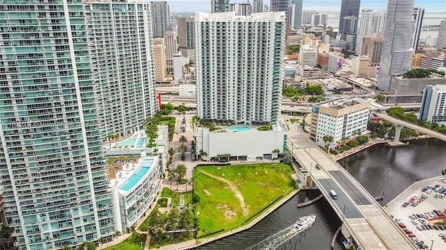 aerial view featuring a water view and a city view