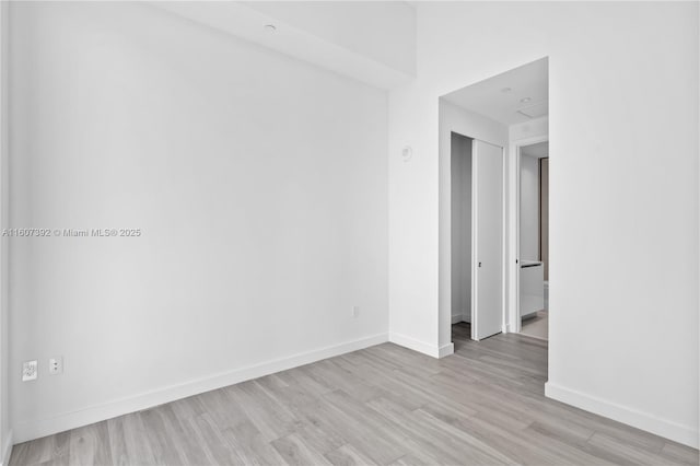 empty room with light wood-type flooring