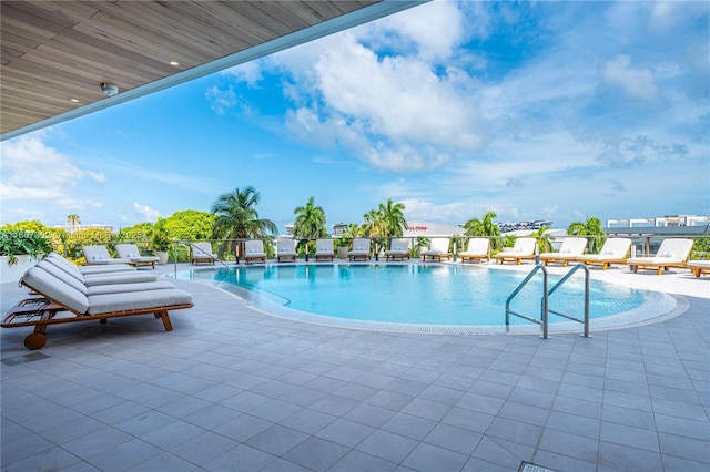 view of pool featuring a patio area