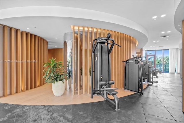 exercise room featuring a wall of windows