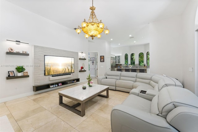 living room with an inviting chandelier