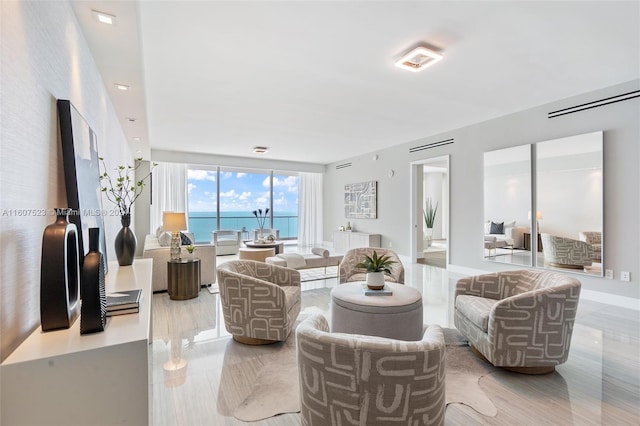 living room featuring a water view