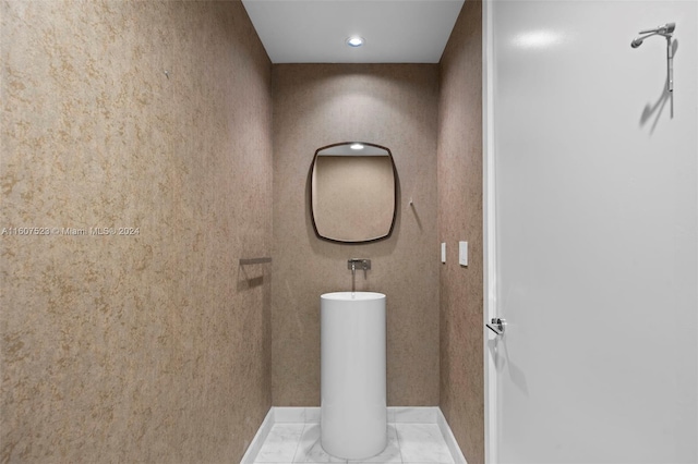 bathroom with tile patterned flooring