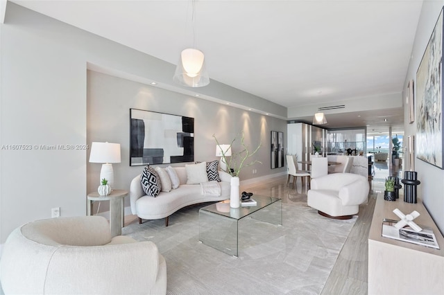 living room with light hardwood / wood-style floors