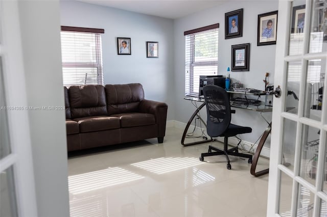 office space with tile floors