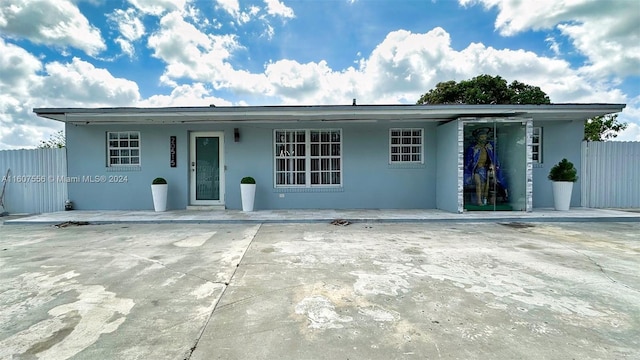 single story home with a patio