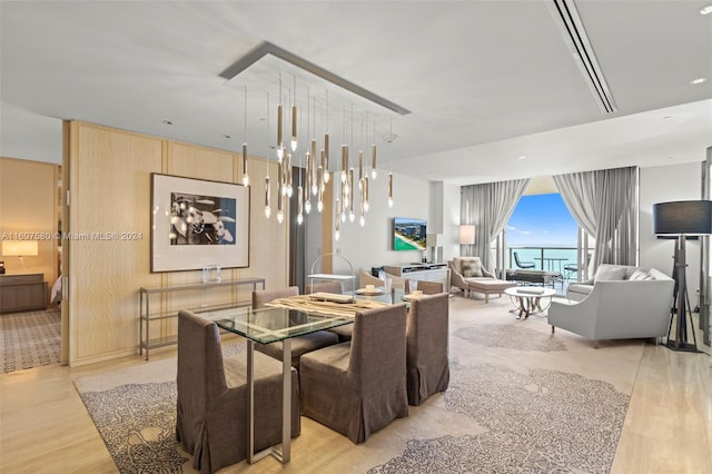 9703 Collins Ave Unit 1205, Bal Harbour, FL 33154 - dining space featuring light wood-type flooring