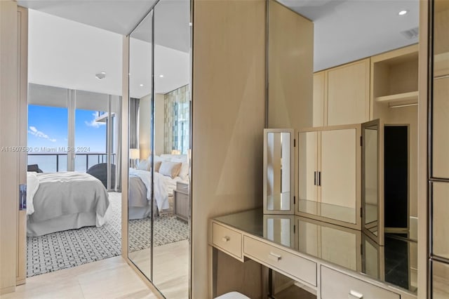 9703 Collins Ave Unit 1205, Bal Harbour, FL 33154 - bathroom featuring connected bathroom and a wall of windows