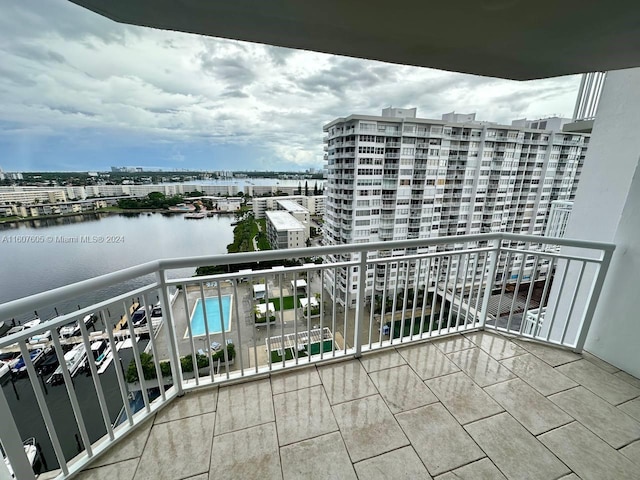 balcony featuring a water view