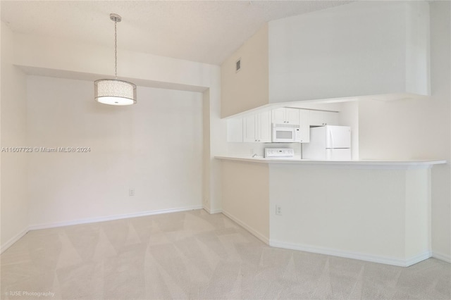 kitchen featuring white cabinets, light carpet, white appliances, and hanging light fixtures