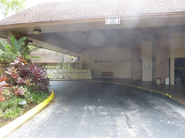 garage with a carport