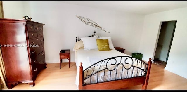 bedroom featuring light hardwood / wood-style floors