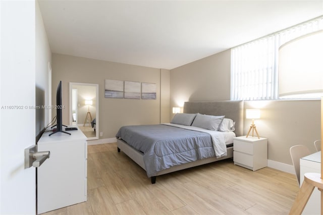 bedroom featuring light hardwood / wood-style flooring