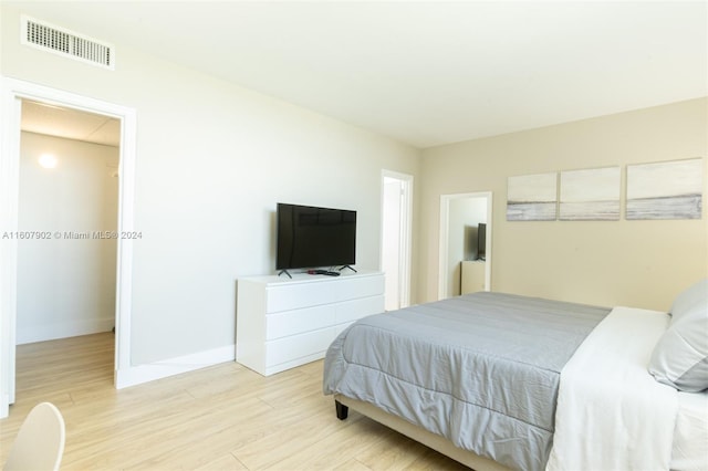 bedroom featuring light wood-type flooring