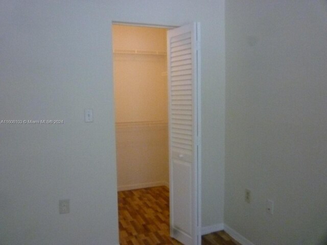 hall featuring hardwood / wood-style floors