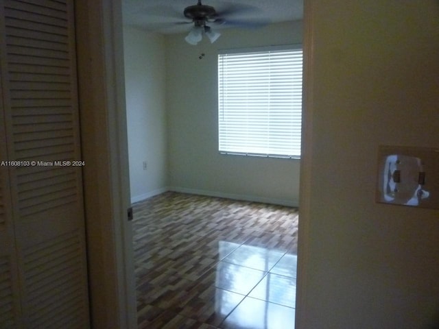 unfurnished room featuring ceiling fan